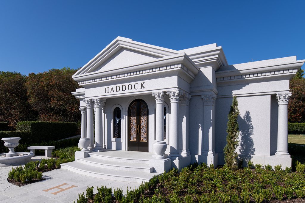 Private family estate mausoleum with classical columns and a gabled entrance