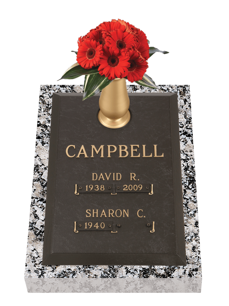Vertical bronze memorial with vase